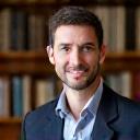 Headshot of Dr. Alistair Finch, a senior museum curator.